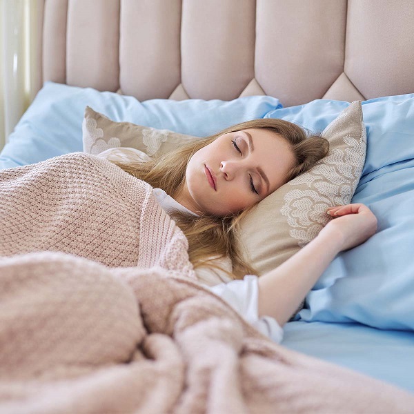 Woman sleeping in bed